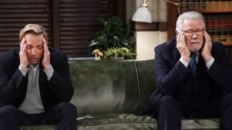 Two co-workers having migraines on the couch.