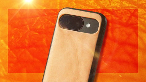 A mobile phone with human-like skin, amid a sunny backdrop.
