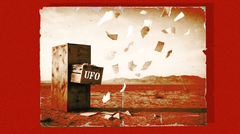 A retro shot of a filing cabinet out in the desert, with paper blowing out of it.
