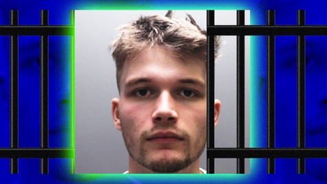 young blond man in grey-ish picture with jail bars around him