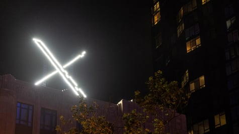X sign