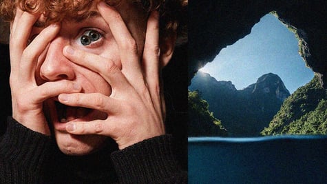 curley ginger hair, two pupils in one eye, lace, cave, blue sky, open mouth