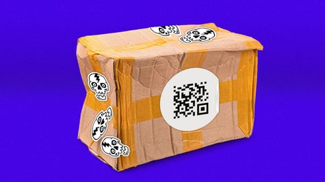 cardboard box with white broken animated sculls, qr code