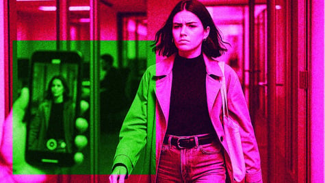 An influencer walking out on her job while filming it on her phone.