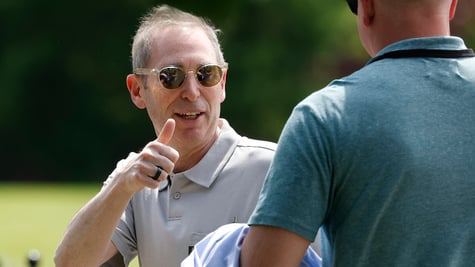 Amazon CEO Andy Jassy giving a thumbs up