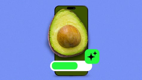 A half of a ripe avocado on a smartphone