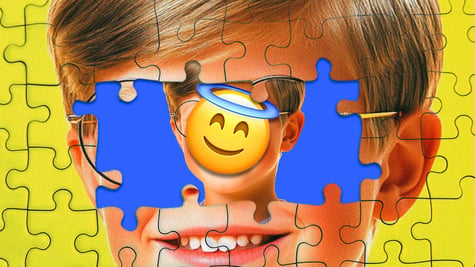 A child with an emoji covering his face