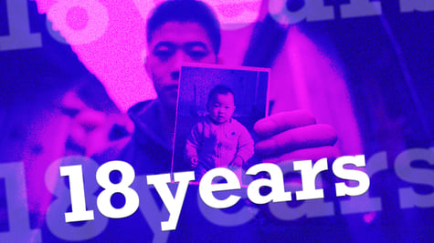 A parent showing their son as a baby and displaying a photograph in China.