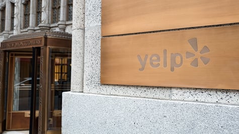 Yelp logo on a building