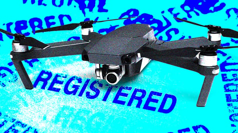 black frone on light electric blue sign REGISTERED