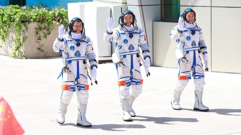 Chinese astronauts Chen Dong, Chen Zhongrui, and Wang Jie