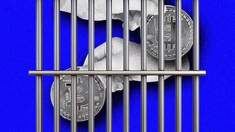 hands-in-a-jail-cell
