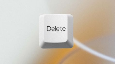 A white "Delete" keyboard button