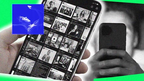 A smartphone screen in grayscale mode, person using phone in bed