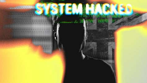 An unidentified hacker with British flag on the background