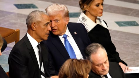 President Barack Obama talking to President Donald Trump