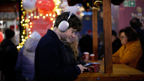 white_man_headphones_scrolling