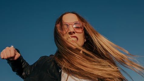young woman with glasses