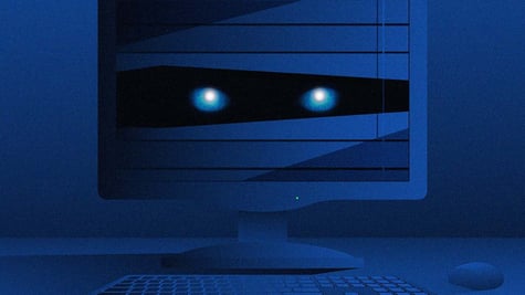 Eyes on the computer screen closely watching the user, concept of surveillance