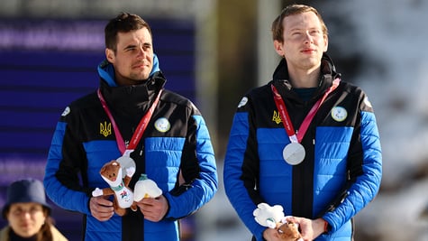 Silver medallist Maksym Murashkovskyi of Ukraine and guide Vitaliy Trush