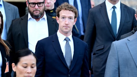 Mark Zuckerberg, pale skin, blue tie, white collar shirt, pale skin, curly light brown hair