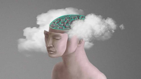 A figure of a person with fog coming out of their scalp