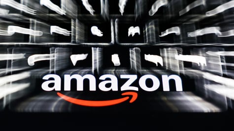 laptop keyboard, Amazon logo, phone screen, multiple exposure illustration, orange arrow