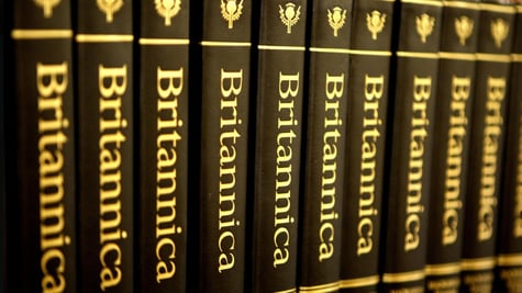 britannica ecyclopedia dark brownbooks, golden, yellow letters, on shelve