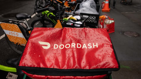 A DoorDash bag on a bicycle in New York, US,