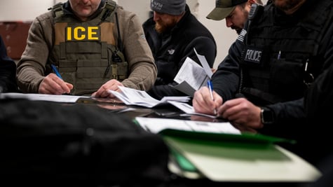 ICE agents during raid