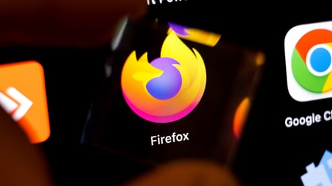 mozilla firfox logo on black screen next to google chrome logo