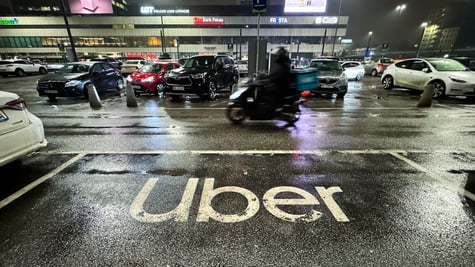 uber sign road motorcycle