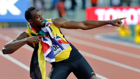 Jamaican sprinter Usain Bolt doing his signature move