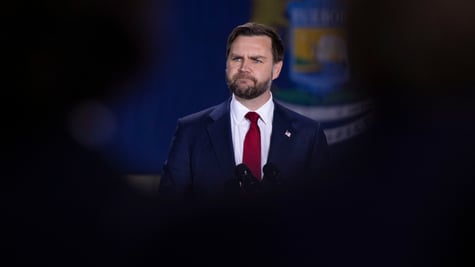 JD Vance on a dark background.