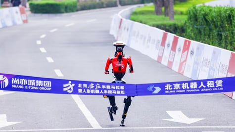 A humanoid robot winning the Beijing half-marathon.