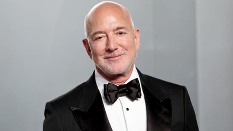 jeff bezos, grey short beard, bald scalp, black tuxedo, white shirt, black bow tie