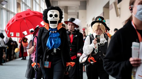 cosplayer, Brook from One Piece costume, white broken scull, red umbrella, shiny blue blouse