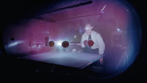 A retro photo of a plasma scientist.
