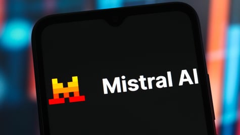 The Mistral AI logo is seen displayed on a smartphone screen