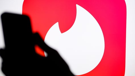 nur photo tinger logo phone