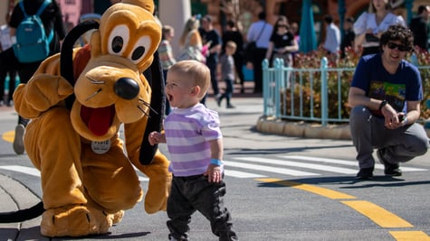pluto dog, disneyland, sunny day, white blonde male todler 