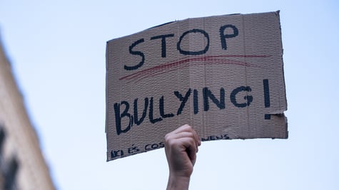 Sign that says "Stop bullying"