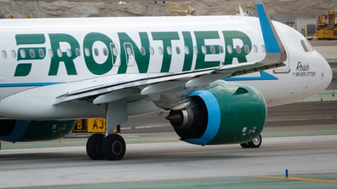A Frontier airplane on the runway