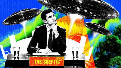 A skeptic sitting below a UFO.