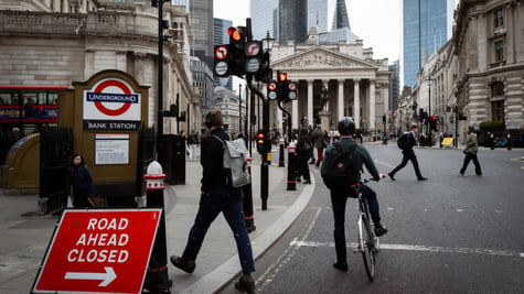 Bank of England building ,cyclist, red traffic sign, 