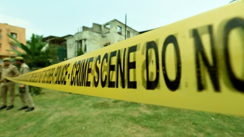 A police entry tape to a crime scene in India.