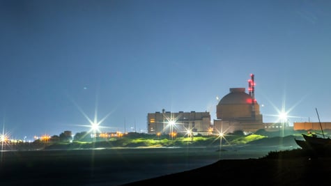 Kudankulam Nuclear Power Plant, dome, vlear blue night sky, two bright white lights