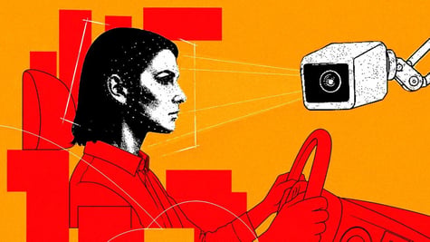 Driver in a car with camera