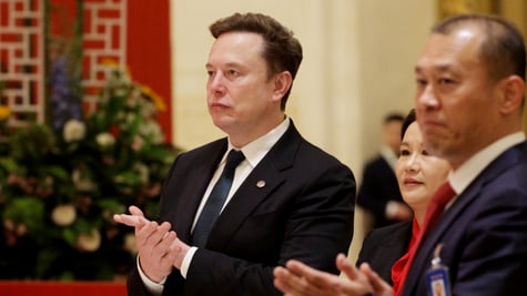 elon musk, white male, black suit, white collar shirt, asian man and woman, red shirt