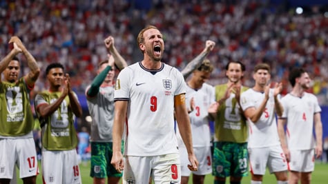 harry kane, white male, white football outfit, red number 9, other men in white sport outfits